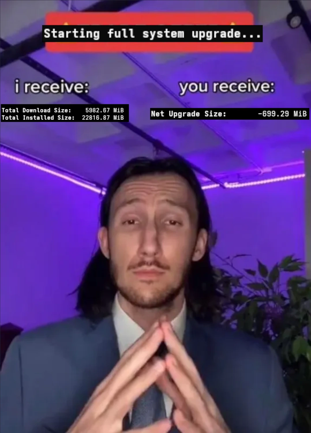 A meme styled like the “I receive / you receive” Meme format. At the top, it says “Starting full system upgrade…”. On the left, under “I receive,” it says “Total Download Size: 5982.67 MiB” and “Total Installed Size: 22816.87 MiB.” On the right, under “You receive,” it says “Net Upgrade Size: –699.29 MiB,” making fun of the fact that Arch updates often reduce used space even though multiple gigabytes may be downloaded